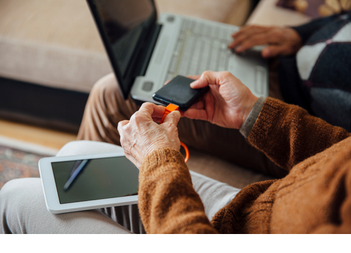 Image of a person using their smartphone